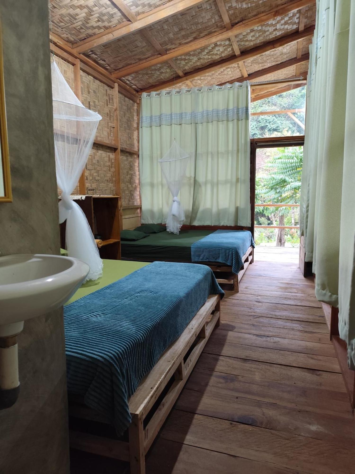 Bua Guesthouse Tangkahan Bagian luar foto