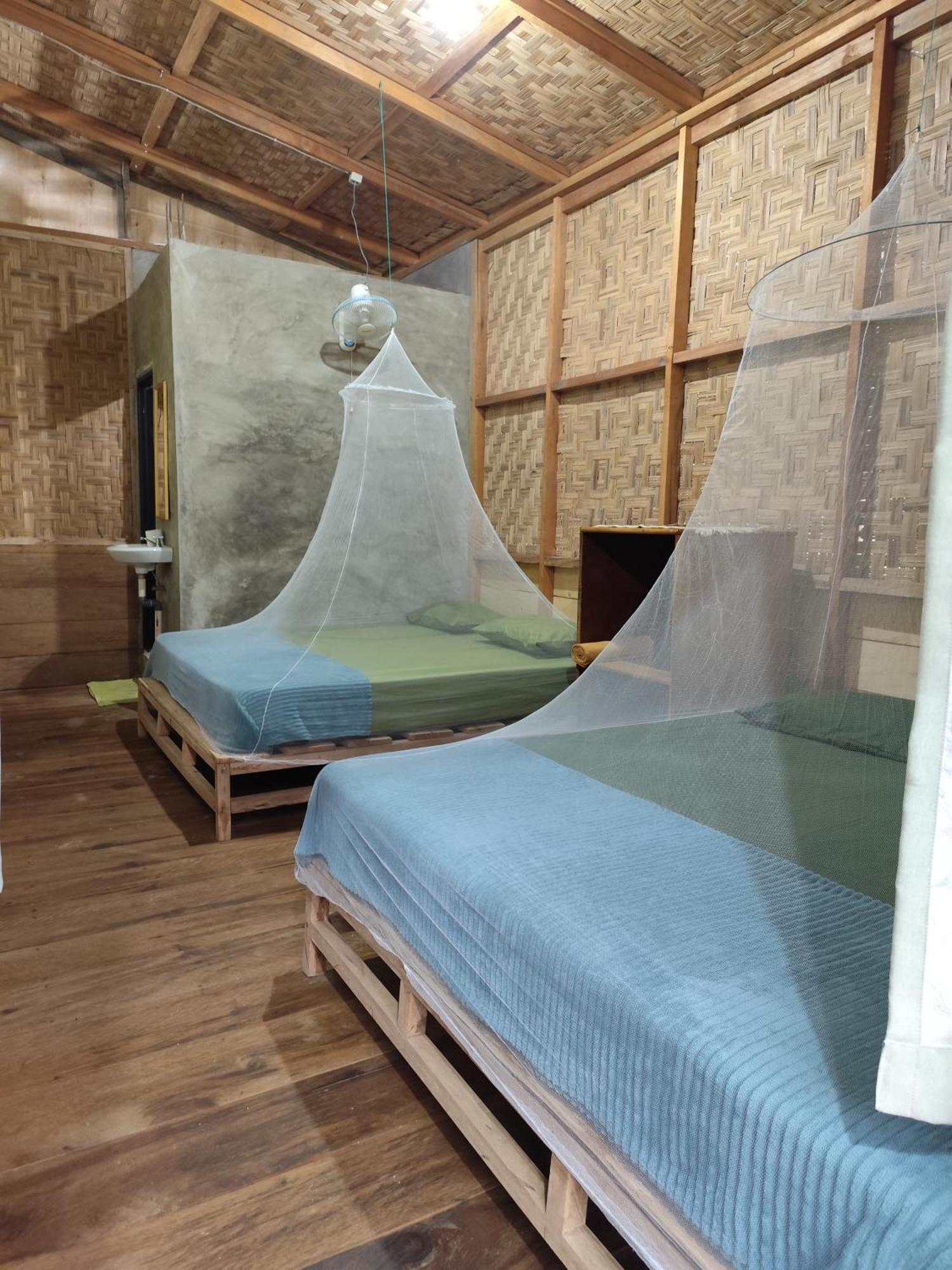 Bua Guesthouse Tangkahan Bagian luar foto